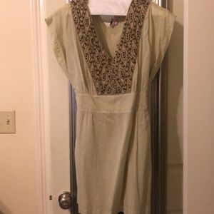 Beaded tie back cream dress